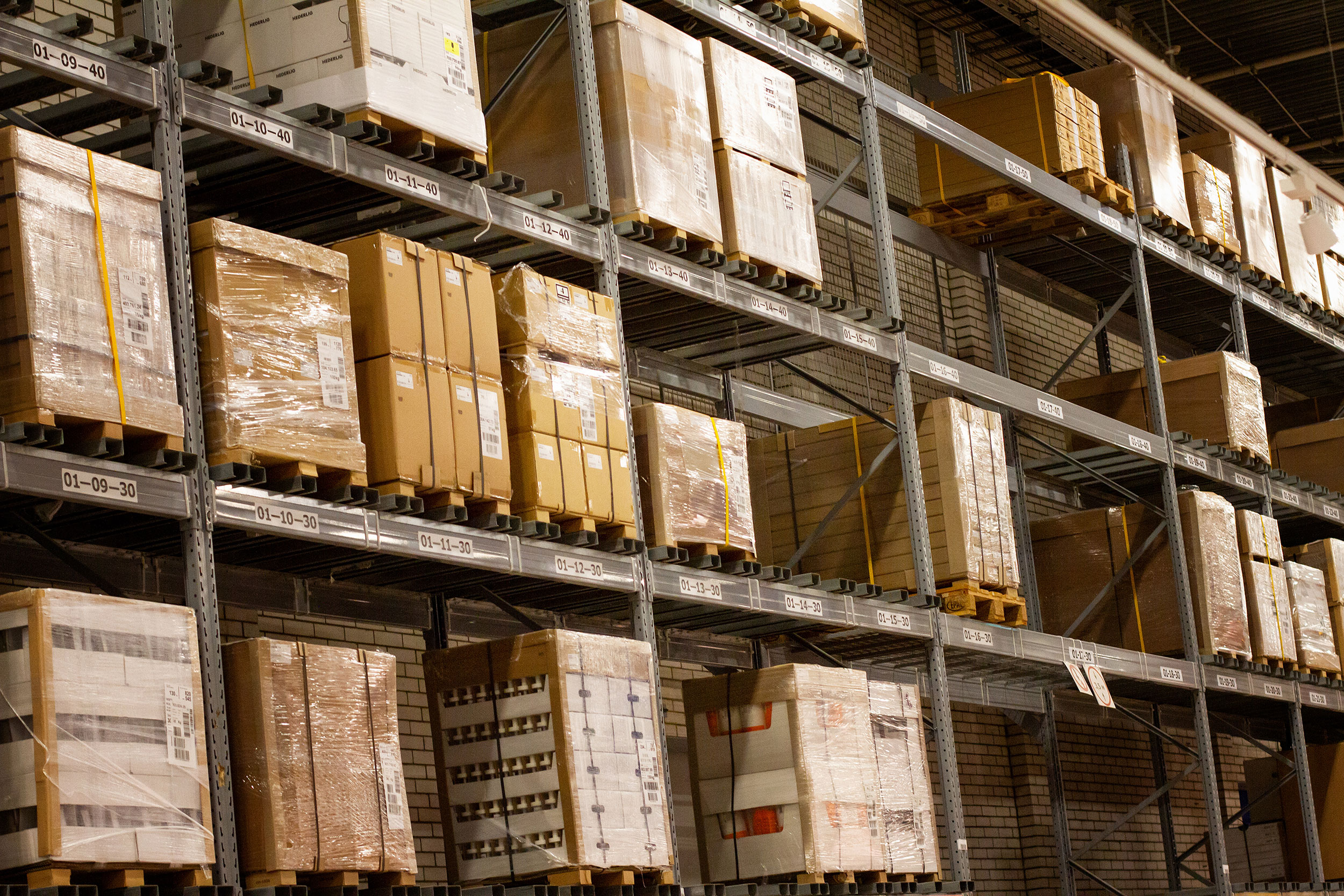 Palleted boxes stacked in a commercial warehouse