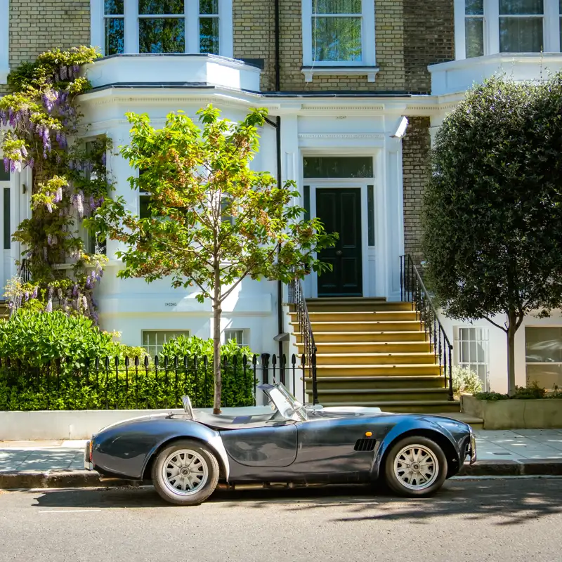 Ford Shelby GT outside of London townhouse