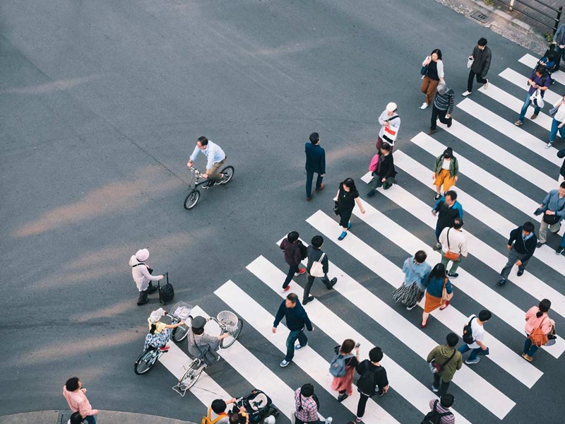Overhead view of a busy city crosswalk.